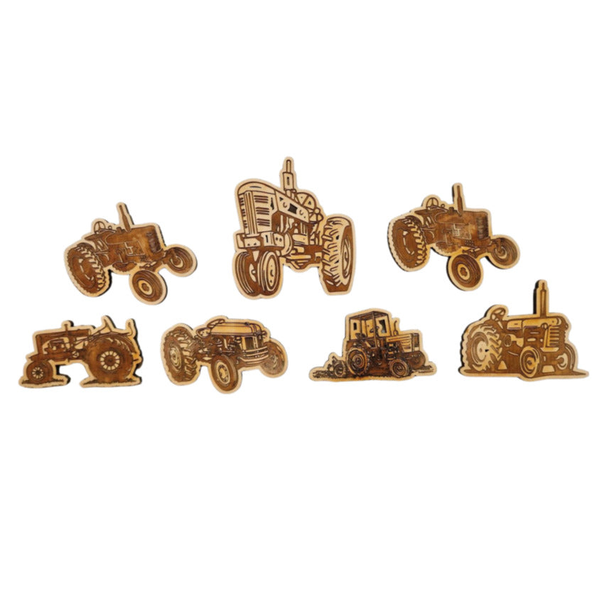 Custom tractor magnet collection by Artisan Branding Company.