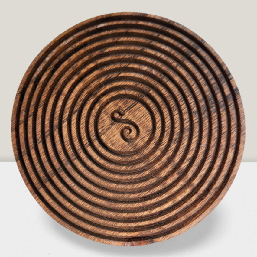 Round custom made wood trivet with grooves by Artisan Branding Company. Personalized