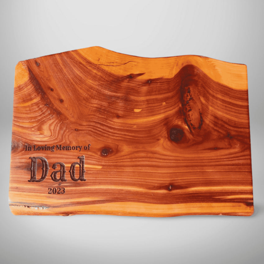 Personalized cedar cutting board by Artisan Branding Company.